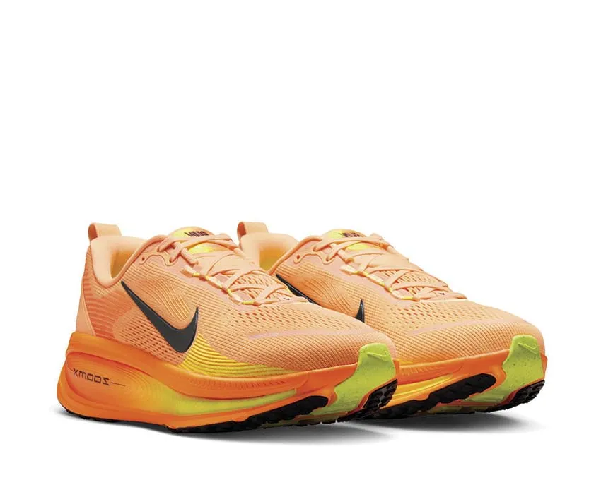 Nike Vomero 18 "Orange Chalk" classic running shoes running in a forest