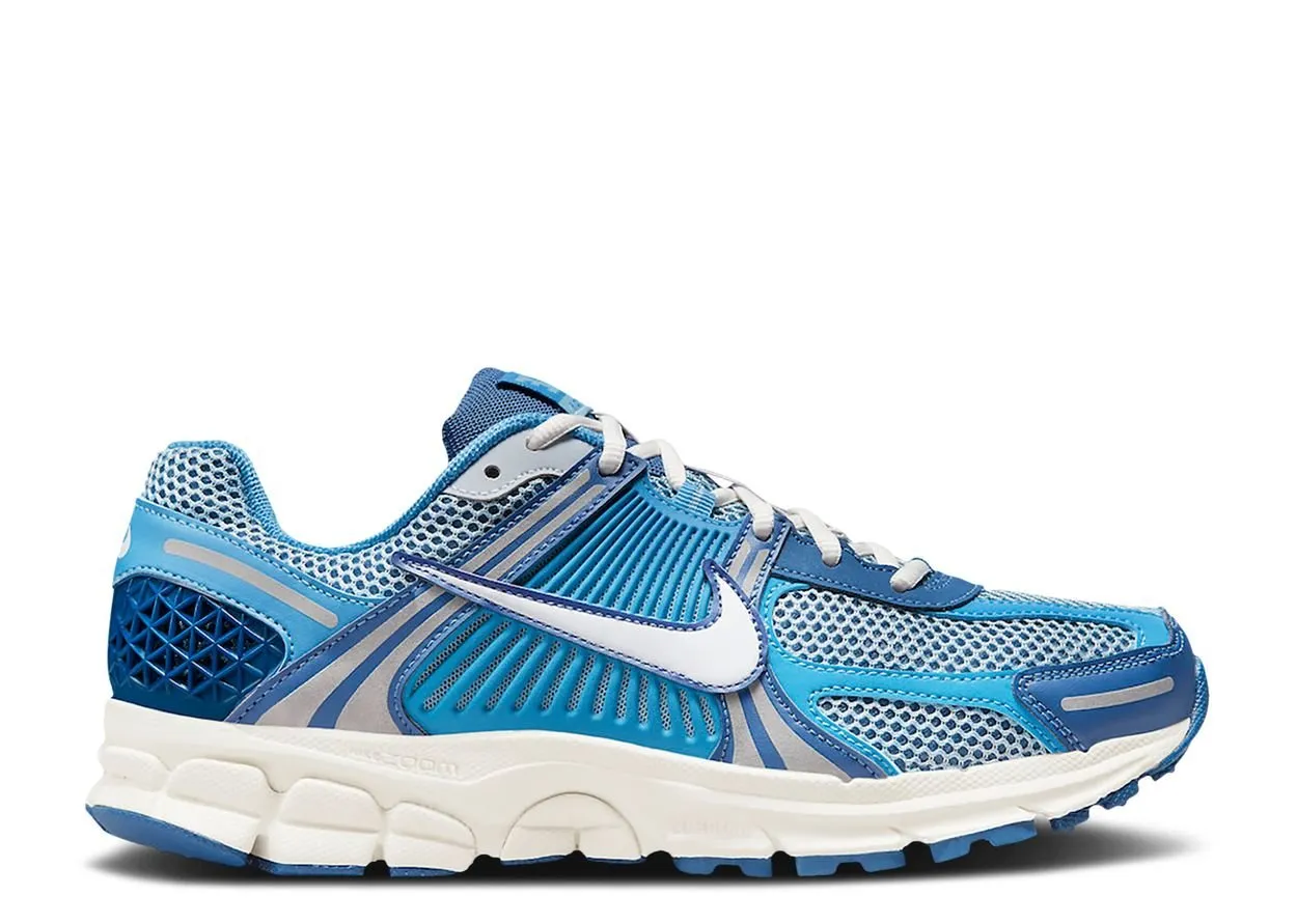 running in a truss bridge area shoes Nike Zoom Vomero 5 Worn Blue
