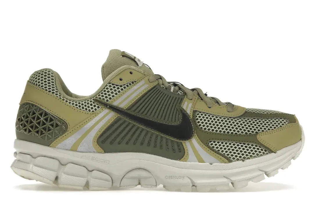 Nike Zoom Vomero 5 Neutral Olive running in a dance studio shoes