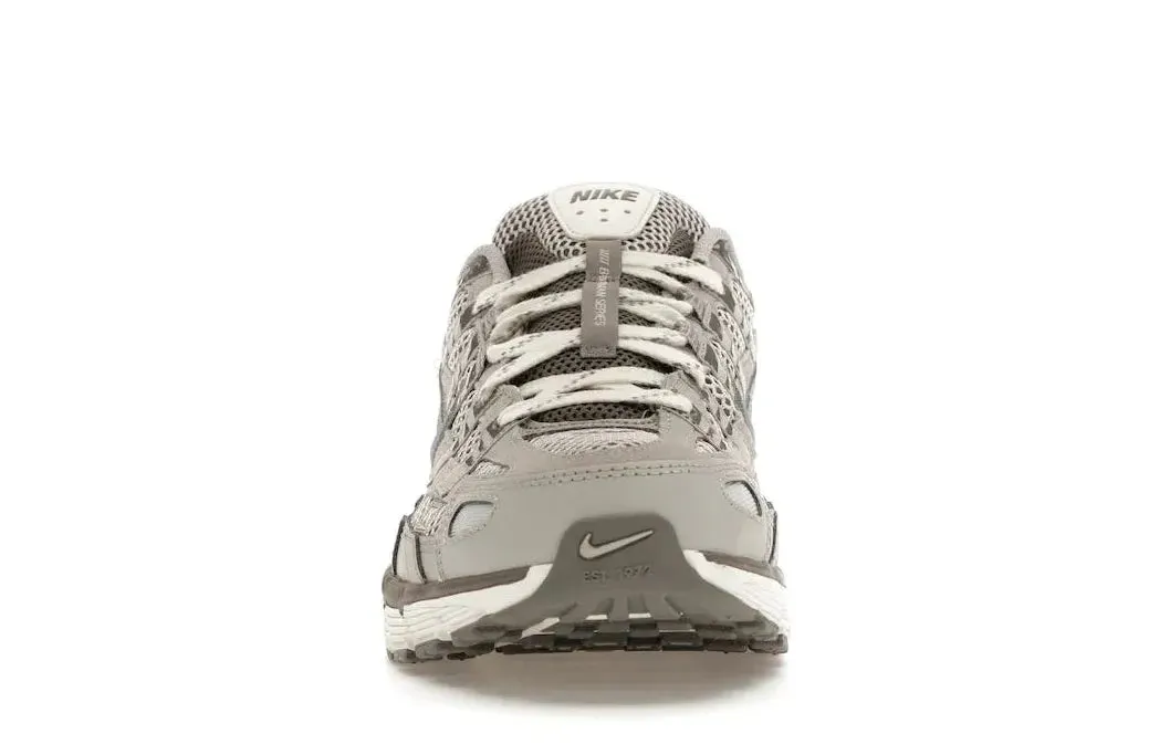 non - competitive rubber - track running shoes Nike P-6000 Light Iron Ore