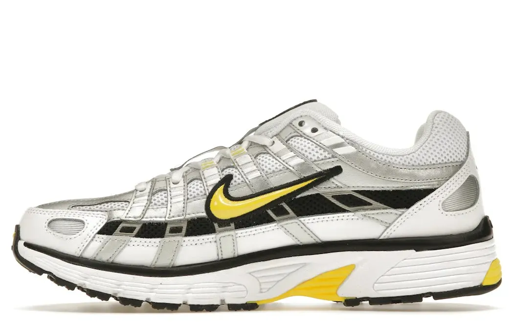 running in a city park shoes Nike P-6000 Metallic Platinum Opti Yellow (Women's)