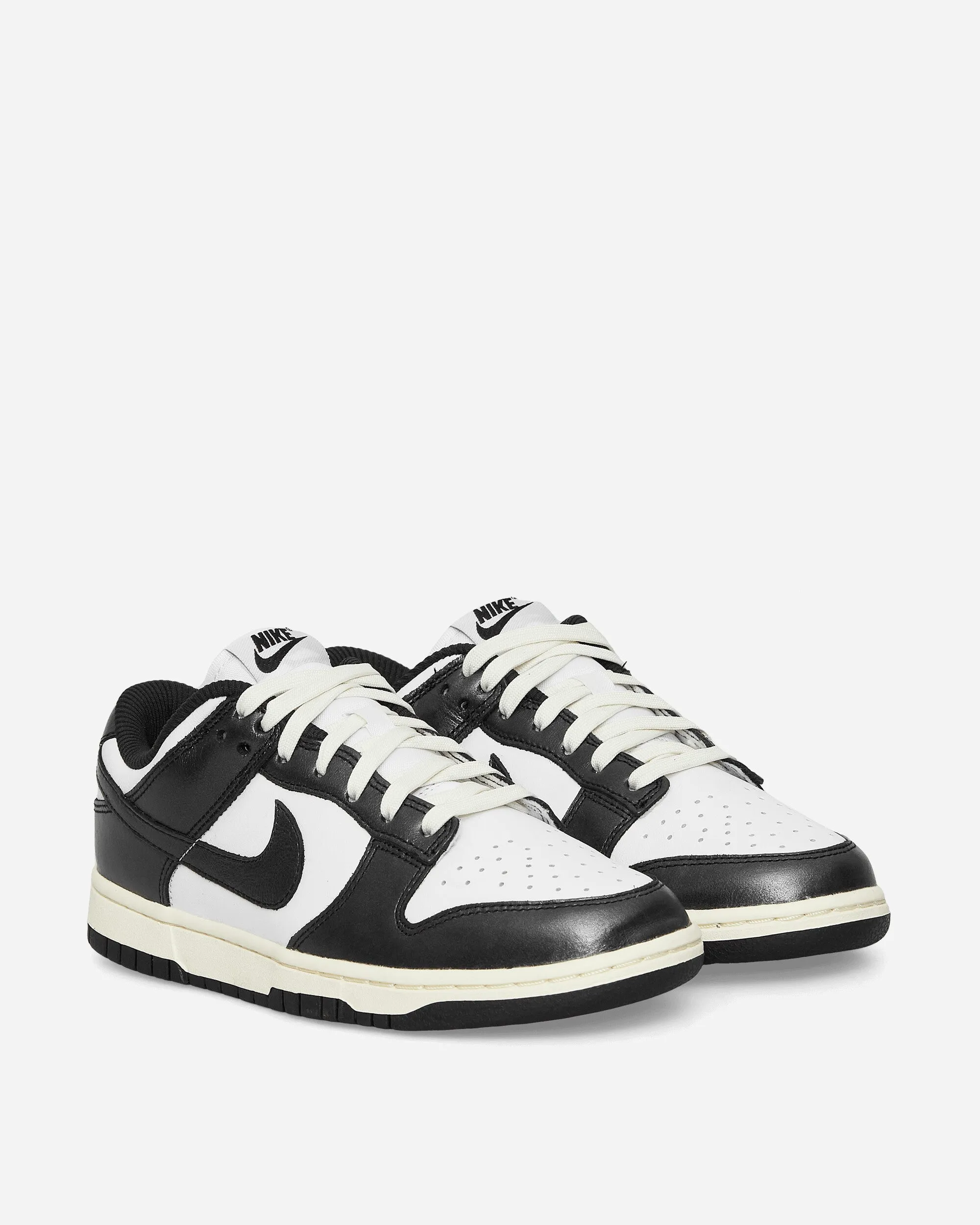 Women's Dunk Low Premium Sneakers White / Black / Coconut Milk Sun Glow Leather